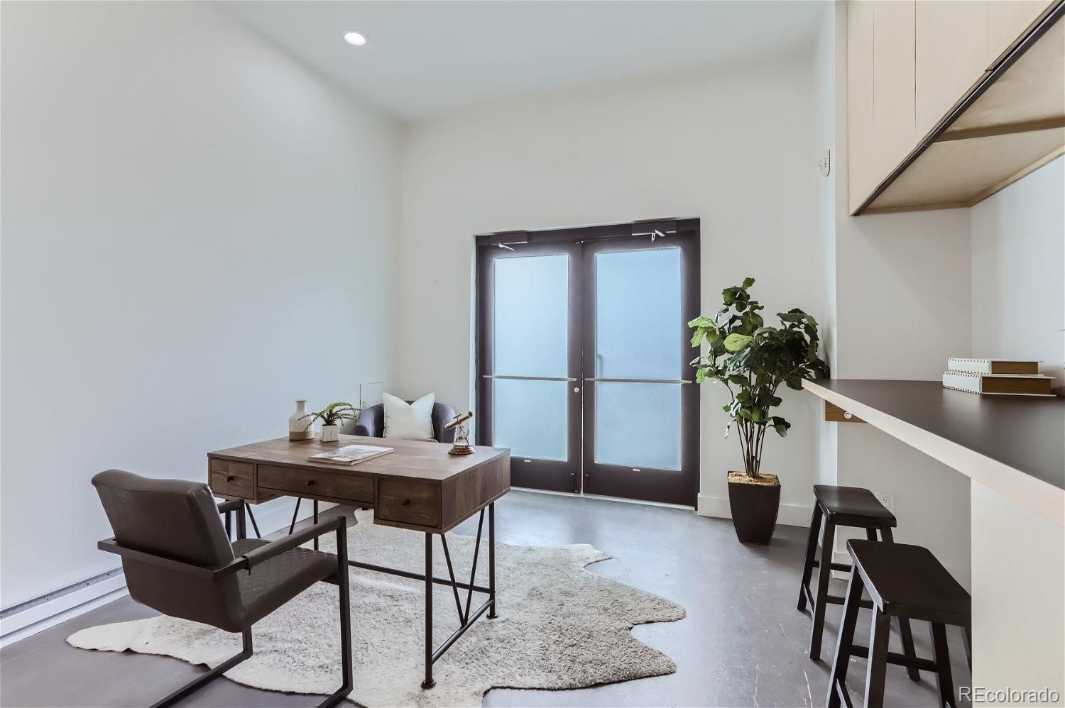 4645 Broadway, Unit B8 Boulder, CO 80304 - Photo 28 of 39 a dining room with furniture and a potted plant
