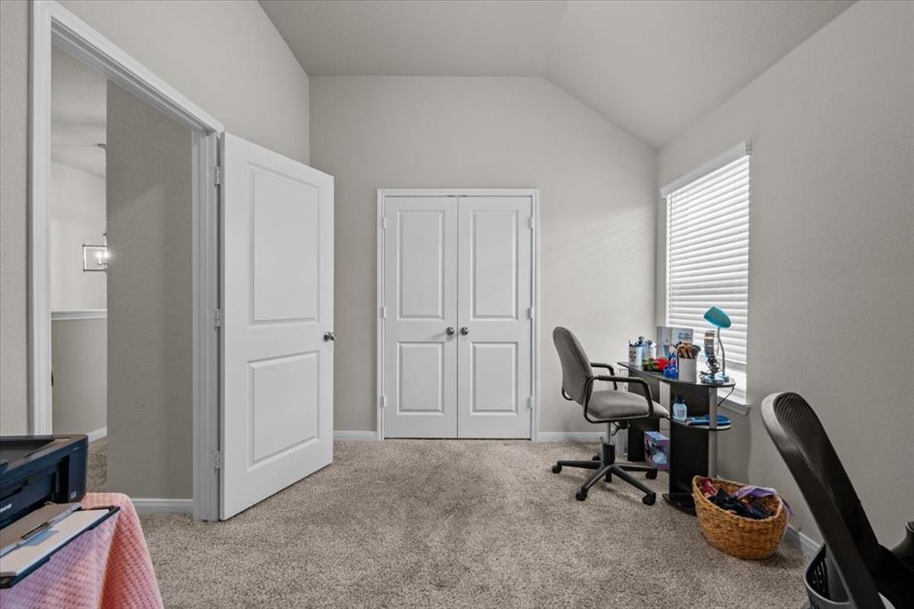 3501 Beutel Road Lorena, TX 76655 - Photo 19 of 33 Carpeted home office featuring vaulted ceiling and baseboards