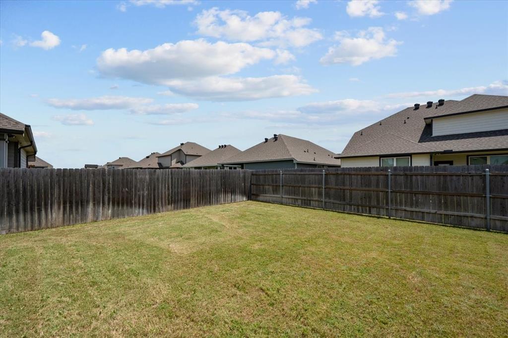3501 Beutel Road Lorena, TX 76655 - Photo 31 of 33 Fenced backyard with a residential view