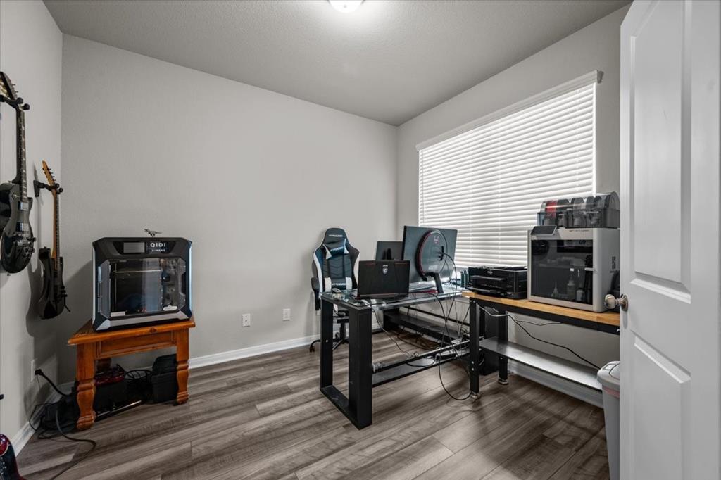 3501 Beutel Road Lorena, TX 76655 - Photo 4 of 33 Office area with wood finished floors and baseboards