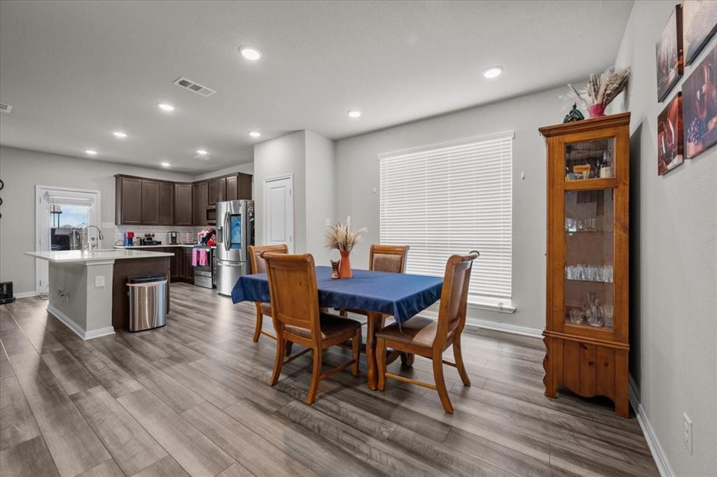 3501 Beutel Road Lorena, TX 76655 - Photo 5 of 33 Dining area featuring wood finished floors and recessed lighting