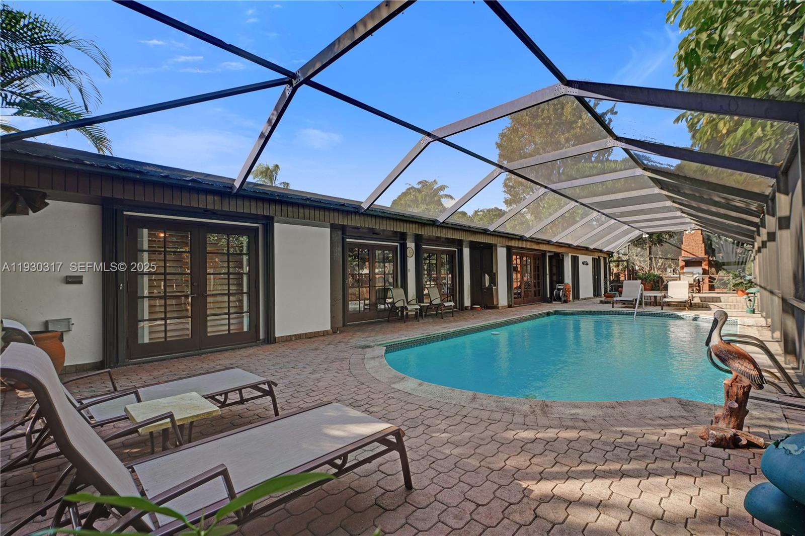 a view of a dinning table and chair in the patio