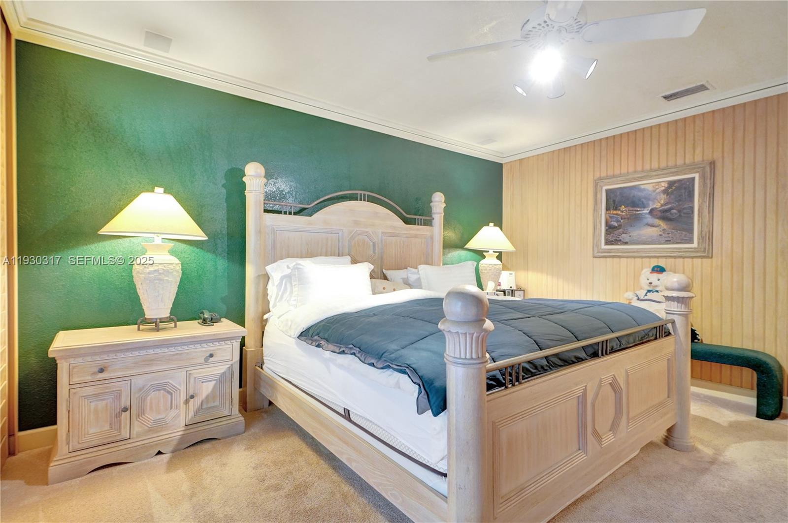 8115 Southwest 92nd Court Miami, FL 33173 - Photo 16 of 42 a bedroom with a bed and a table