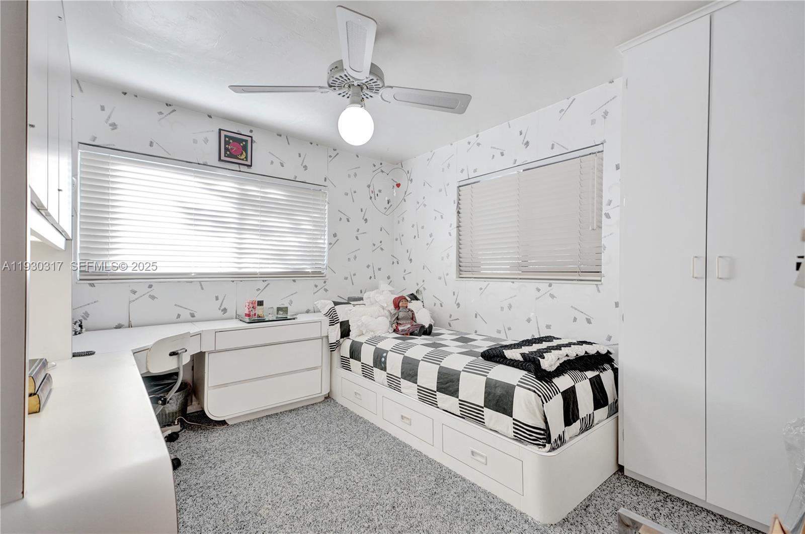 8115 Southwest 92nd Court Miami, FL 33173 - Photo 17 of 42 a white kitchen with a sink and a stove top oven