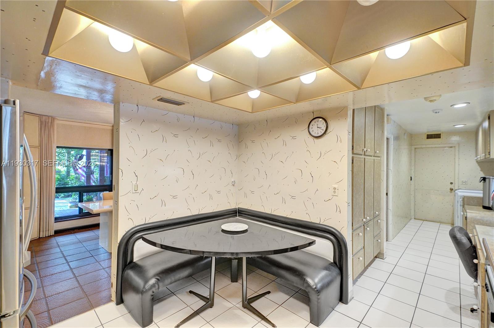 8115 Southwest 92nd Court Miami, FL 33173 - Photo 21 of 42 a balcony with a table and chairs