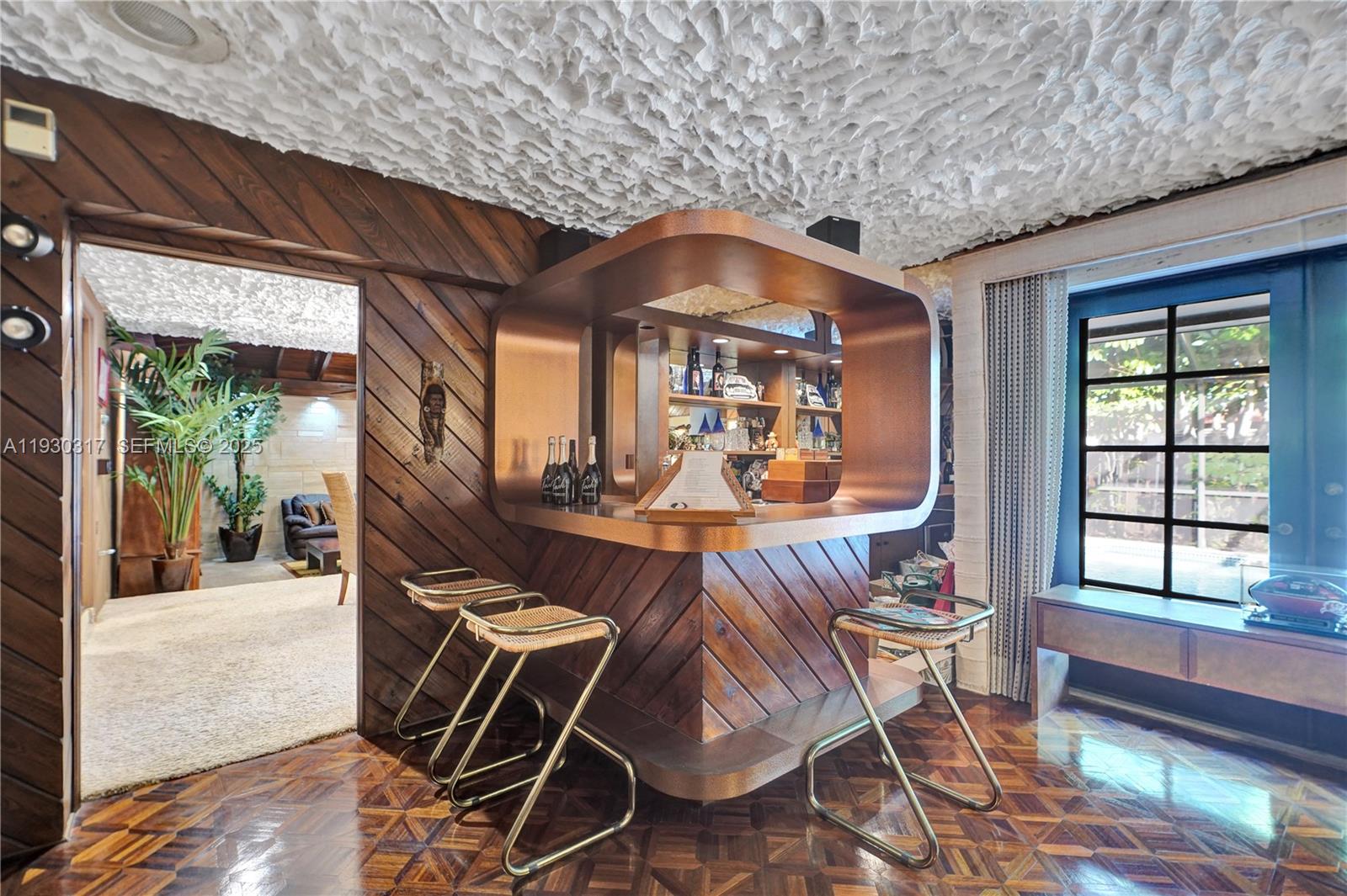 8115 Southwest 92nd Court Miami, FL 33173 - Photo 24 of 42 a view of living room and dining room