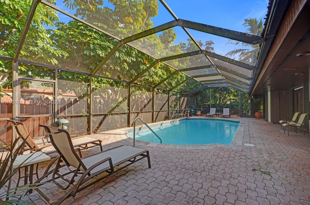 8115 Southwest 92nd Court Miami, FL 33173 - Photo 36 of 42 a backyard of a house with lots of green space