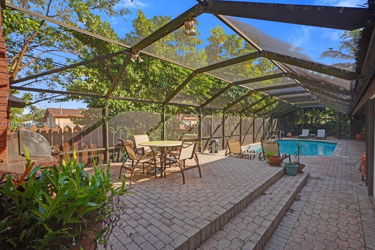 8115 Southwest 92nd Court Miami, FL 33173 - Photo 38 of 42 a view of a backyard with sitting area