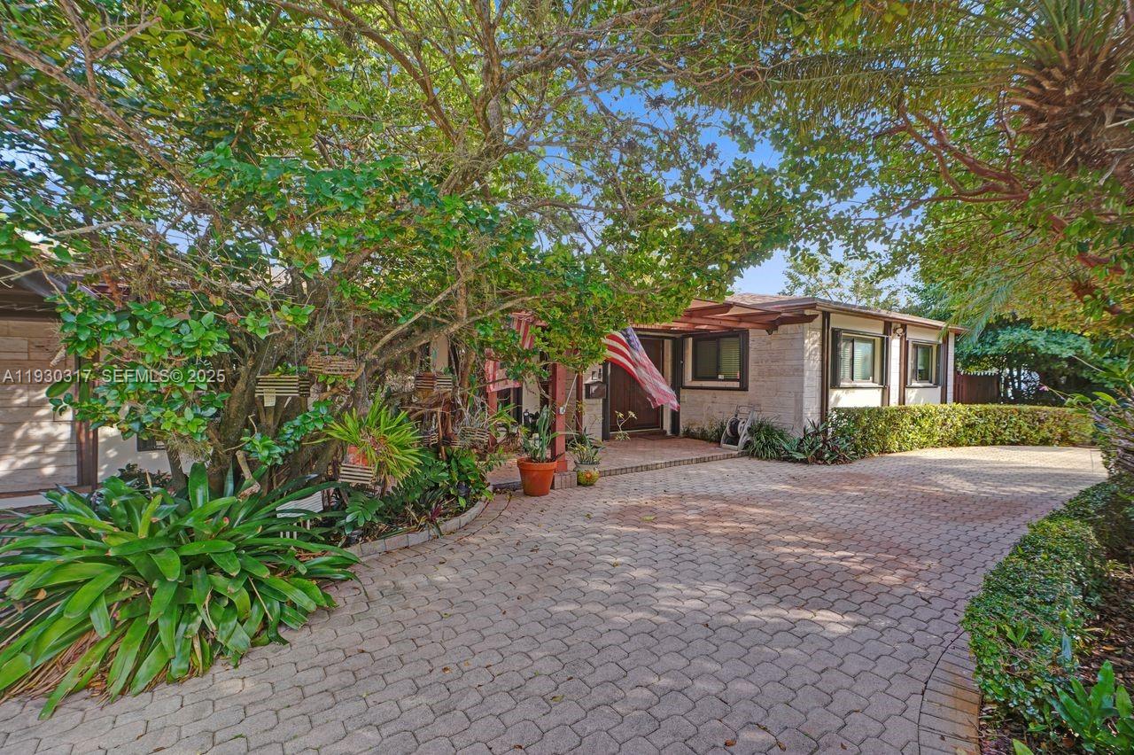 8115 Southwest 92nd Court Miami, FL 33173 - Photo 4 of 42 a view of a house with a tree