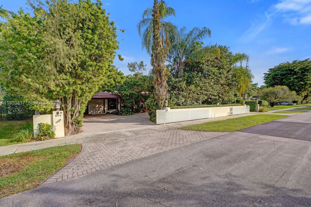 8115 Southwest 92nd Court Miami, FL 33173 - Photo 42 of 42 a view of a house with a yard and tree s