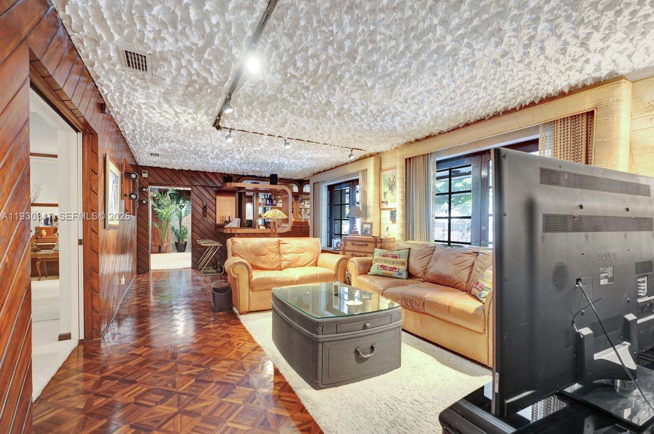 8115 Southwest 92nd Court Miami, FL 33173 - Photo 10 of 42 a living room with furniture