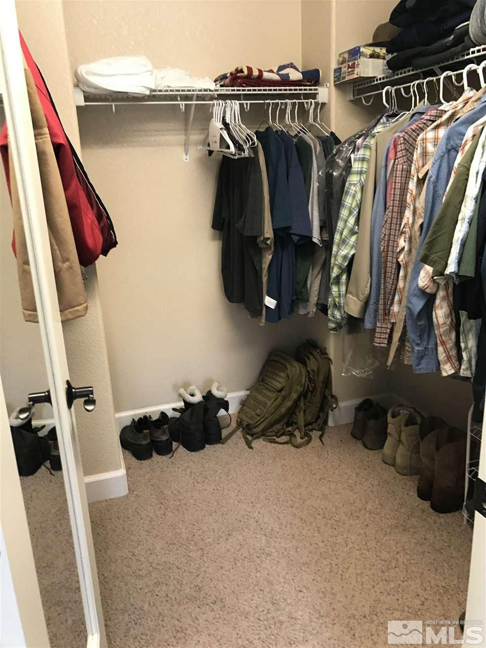 2055 Black Sand Drive Reno, NV 89521 - Photo 15 of 17 a view of walk in closet with clothes and shoes