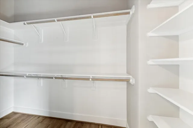 a view of a room with racks on the wall