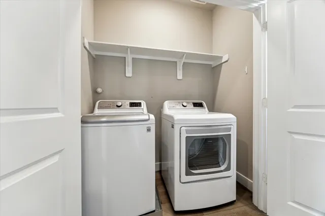 a utility room with dryer and washer