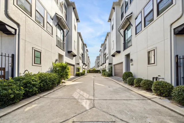 a view of a building with a yard