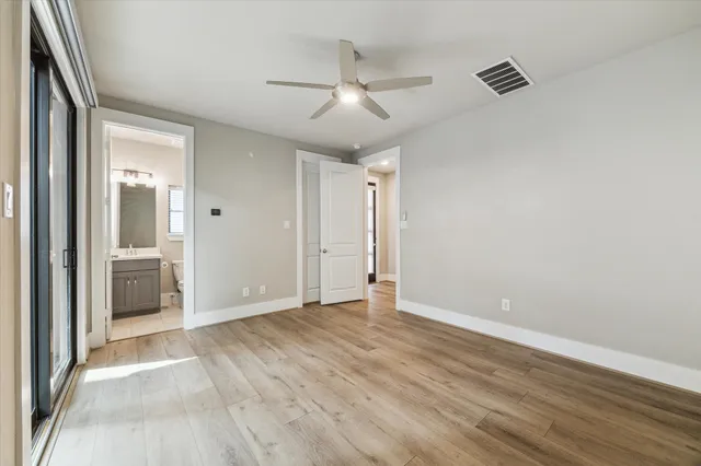 a view of an empty room and window
