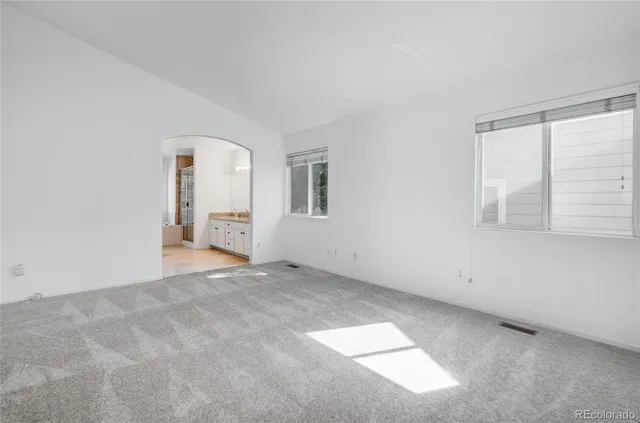 an empty room with windows