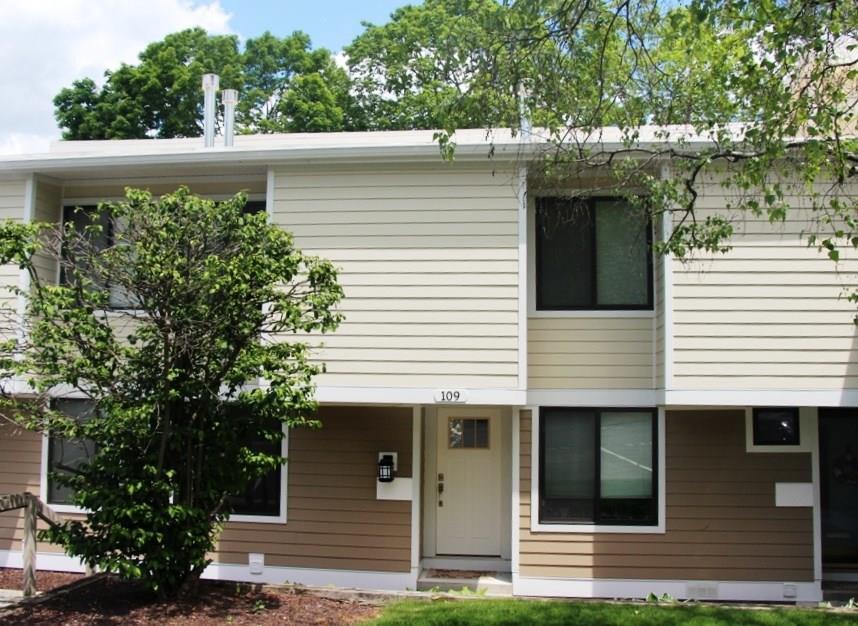 109 Olcott Way, Unit 109 Ridgefield, CT 06877 - Photo 1 of 1 a view of a house with a balcony