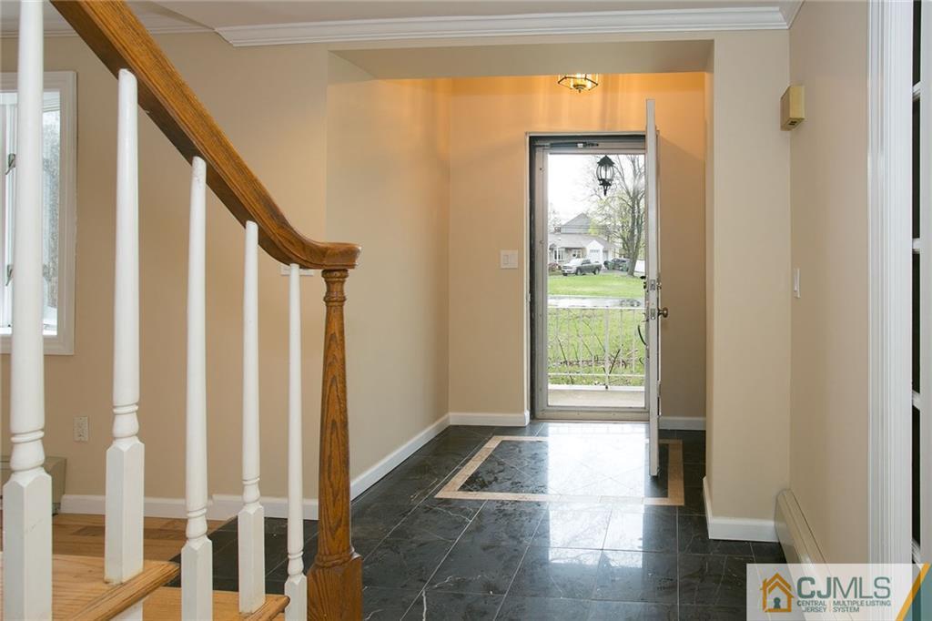 31 Parker Road Edison, NJ 08820 - Photo 5 of 25 a view of entryway with wooden floor