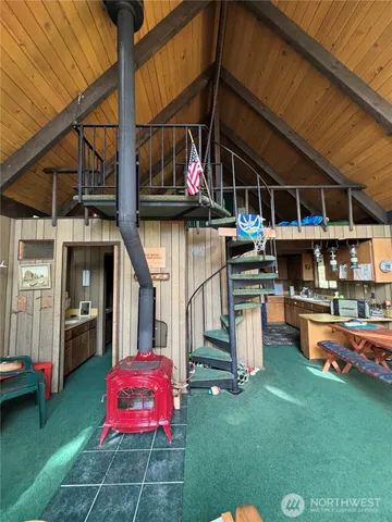 a view of a chairs and table in the patio
