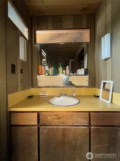 a room with a table and chairs