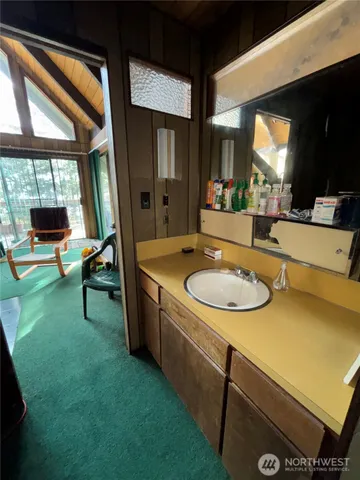 a room with furniture and a large window