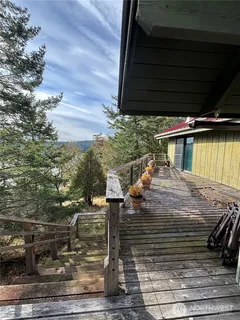 a view of a backyard of the house