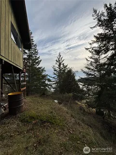 a house with a tree in the background