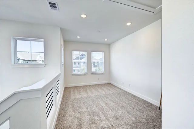 a bedroom with a bed and furniture