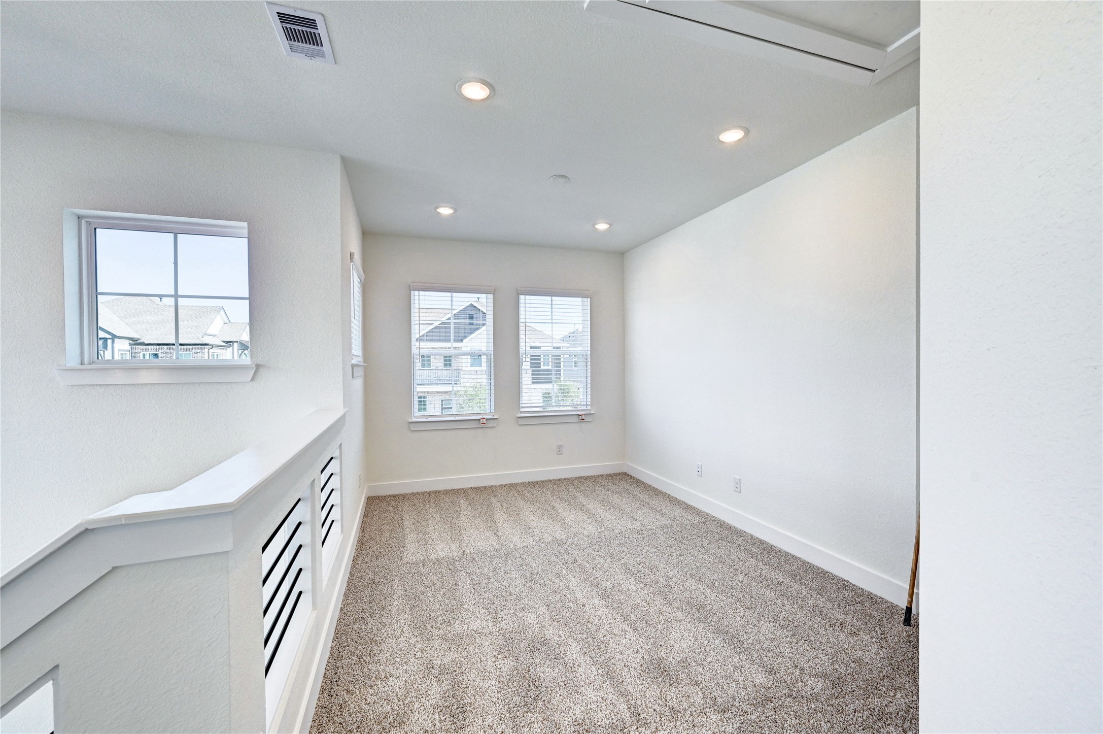 7643 Meadow Mouse Lane Katy, TX 77493 - Photo 15 of 35 an empty room with windows