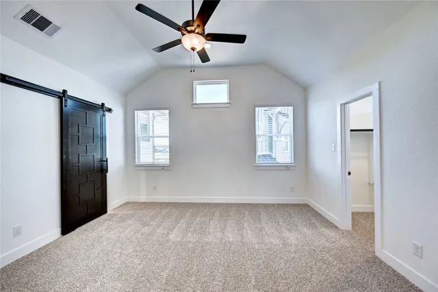 a bathroom with a double vanity sink mirror and shower