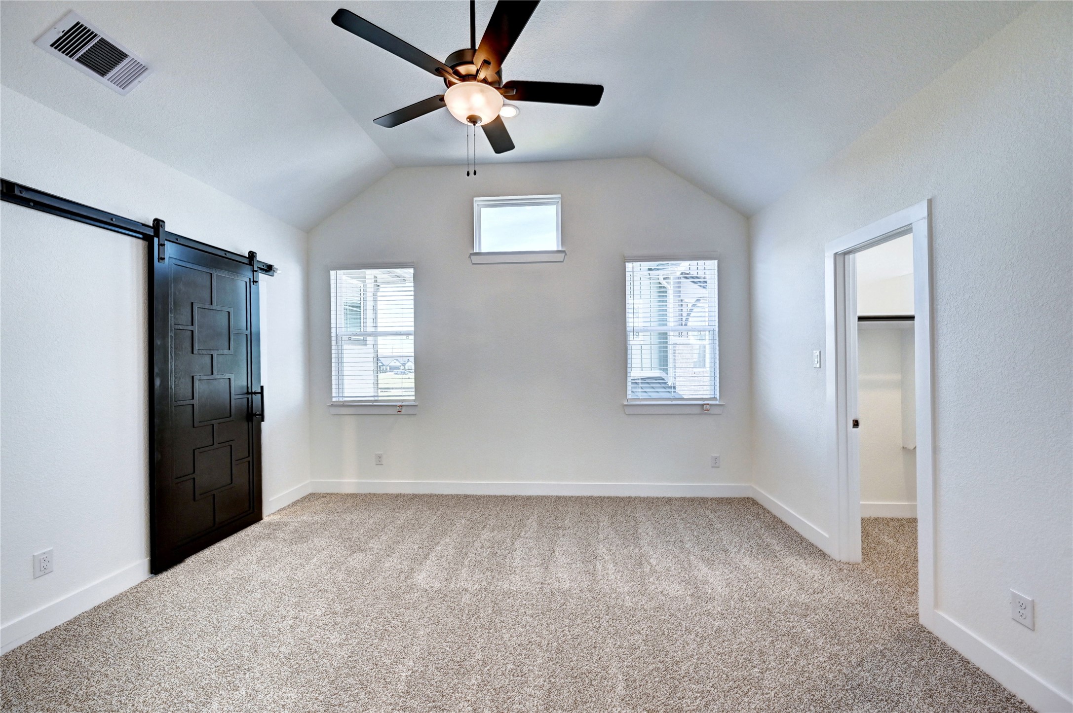 7643 Meadow Mouse Lane Katy, TX 77493 - Photo 17 of 35 a view of an empty room with a window