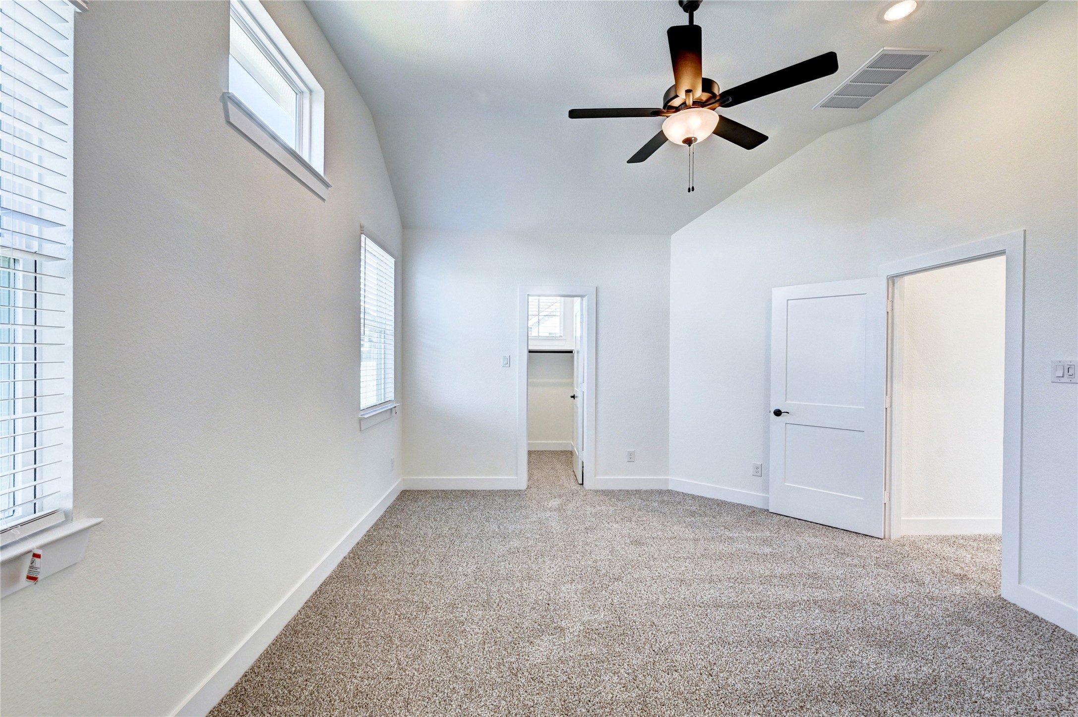 7643 Meadow Mouse Lane Katy, TX 77493 - Photo 22 of 35 a view of an empty room with a window