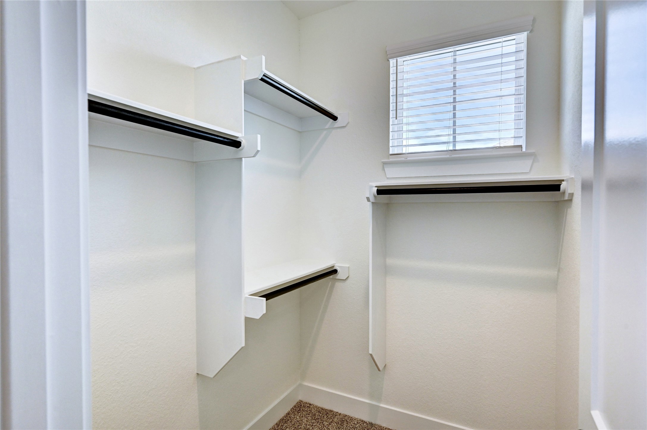 7643 Meadow Mouse Lane Katy, TX 77493 - Photo 23 of 35 a view of walk in closet with window