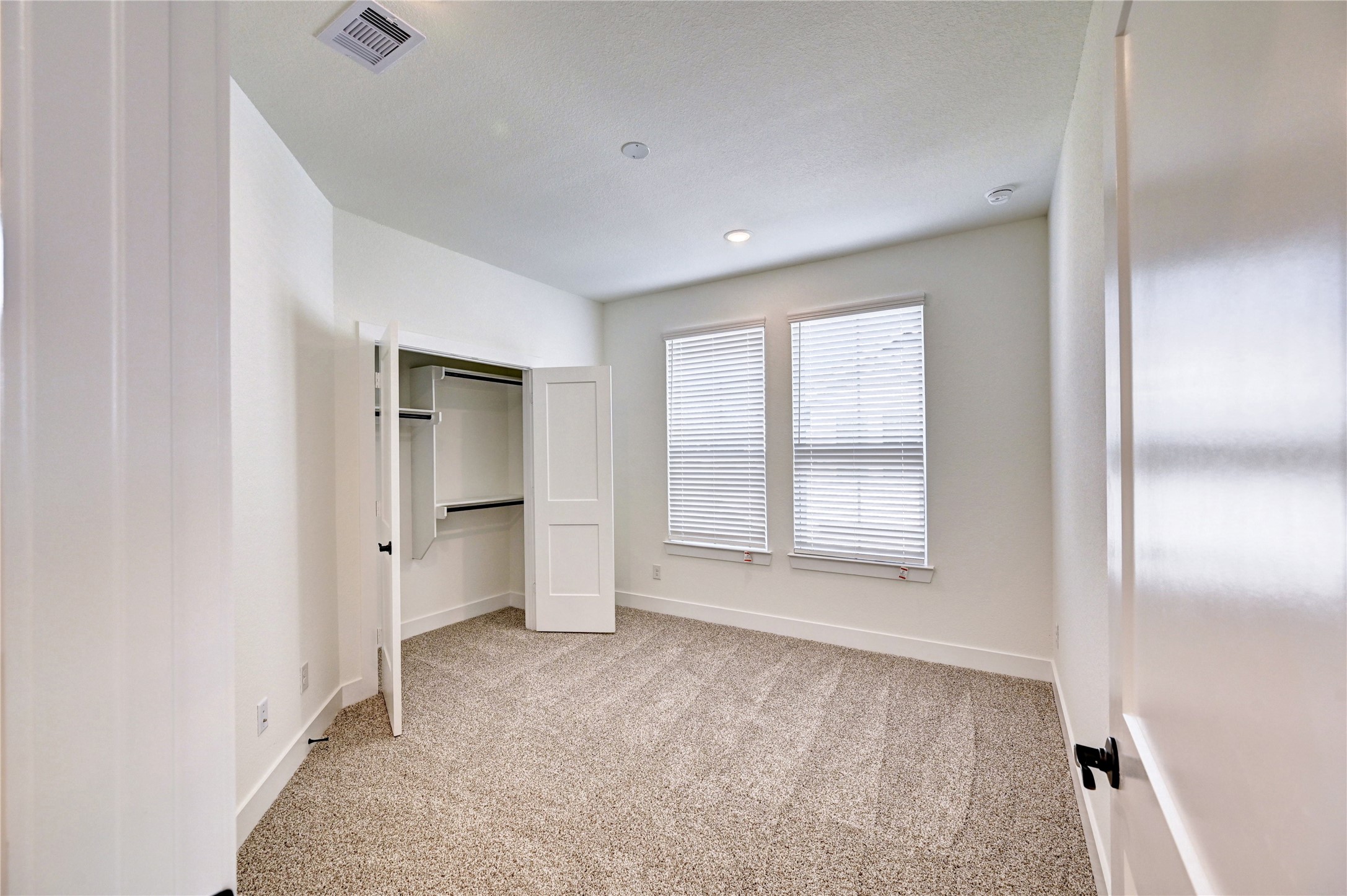 7643 Meadow Mouse Lane Katy, TX 77493 - Photo 25 of 35 a view of an empty room with a window