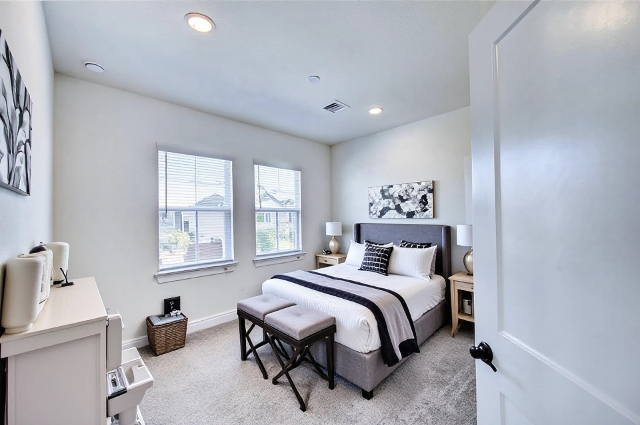 7643 Meadow Mouse Lane Katy, TX 77493 - Photo 27 of 35 a bedroom with a bed and wooden floor