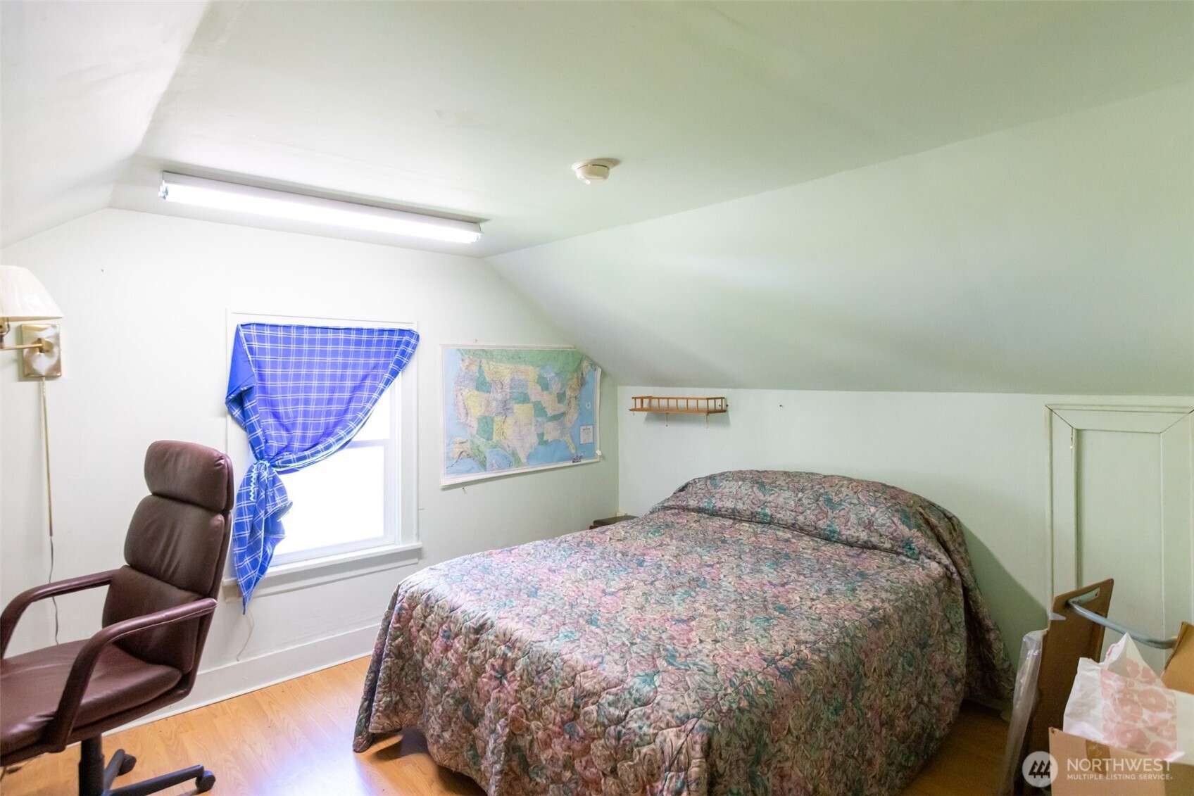 992 Highway 142 Lyle, WA 98635 - Photo 39 of 40 a bedroom with a bed chair and window