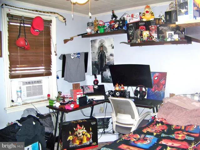 a group of people sitting in front of flowers