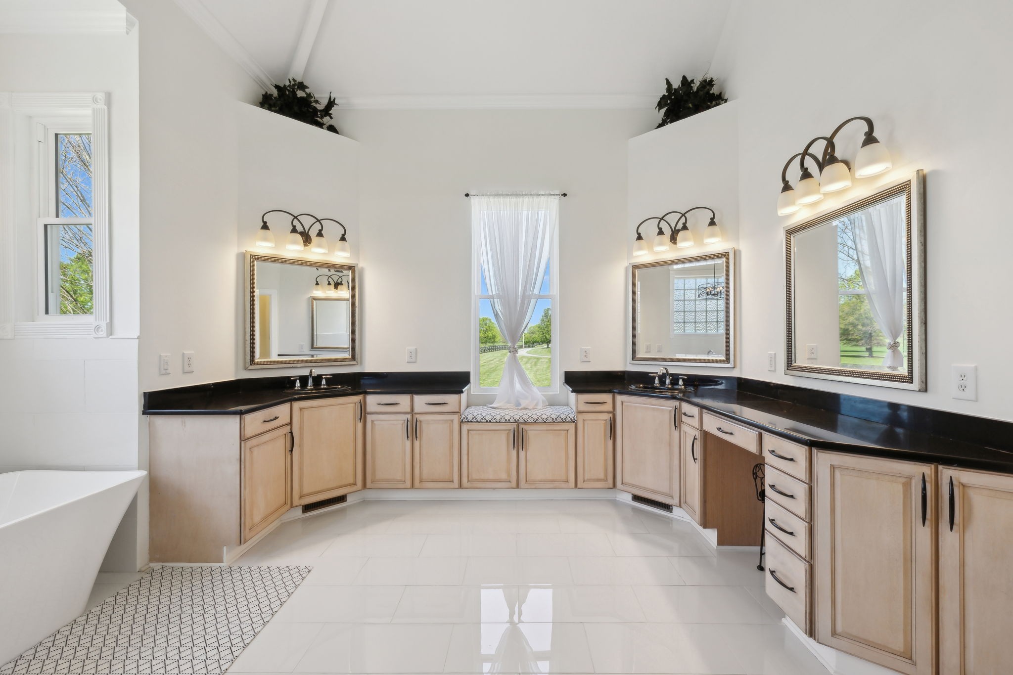 422 Davis Road Lebanon, TN 37087 - Photo 42 of 87 a large white kitchen with granite countertop a sink and dishwasher a stove with wooden floor