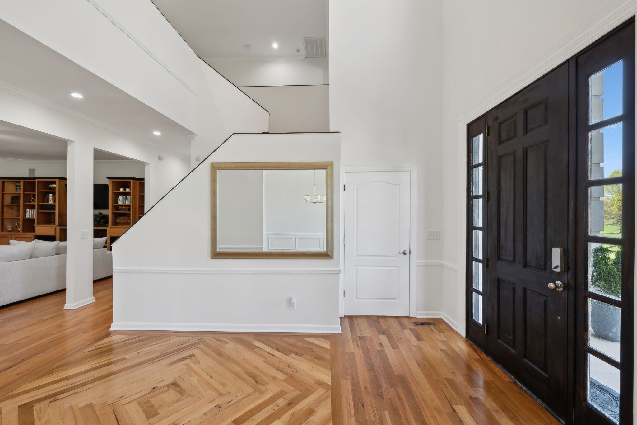 422 Davis Road Lebanon, TN 37087 - Photo 5 of 87 a view of a livingroom with wooden floor and staircase
