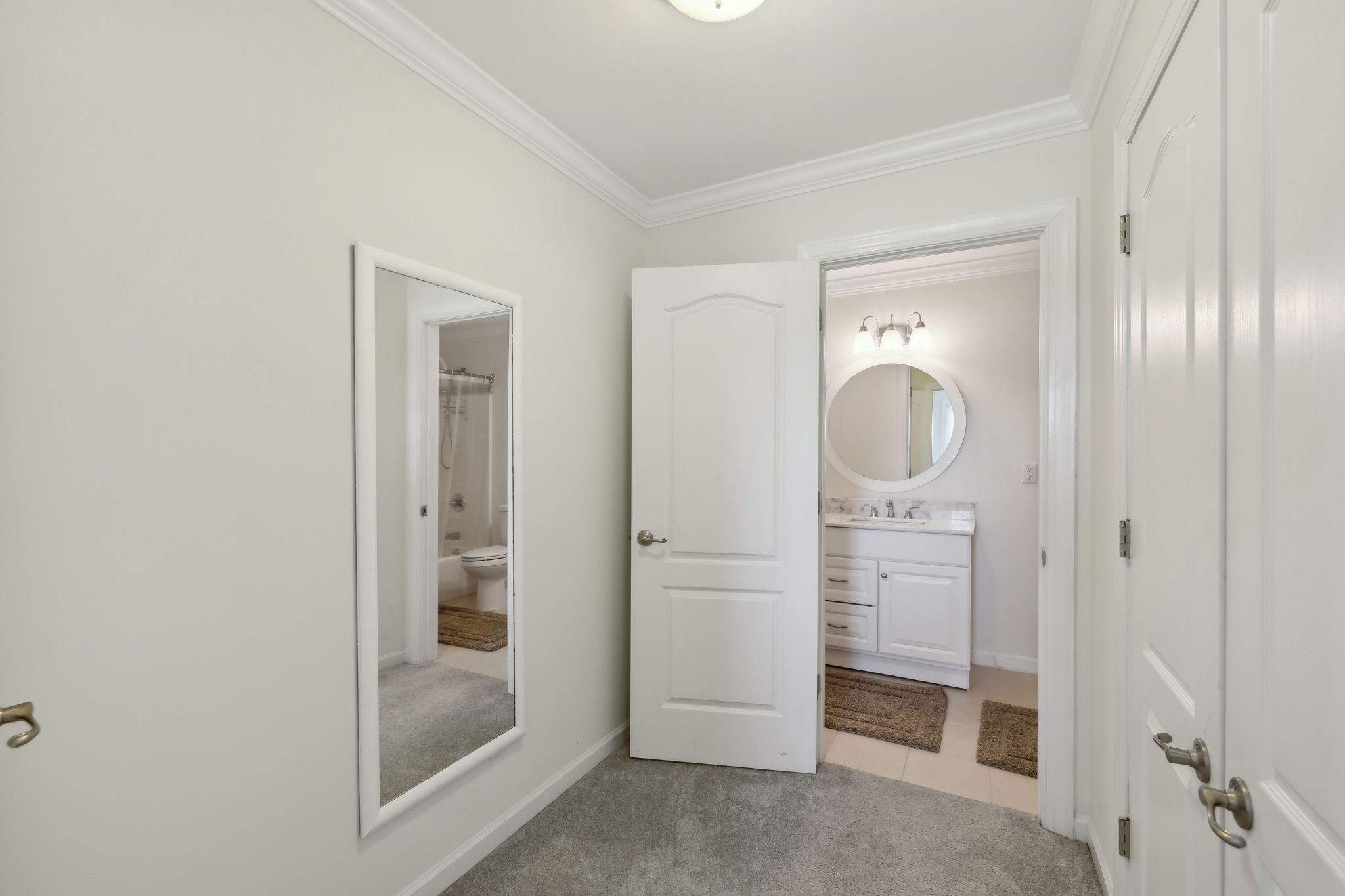 422 Davis Road Lebanon, TN 37087 - Photo 55 of 87 a bathroom with a shower a mirror and a sink