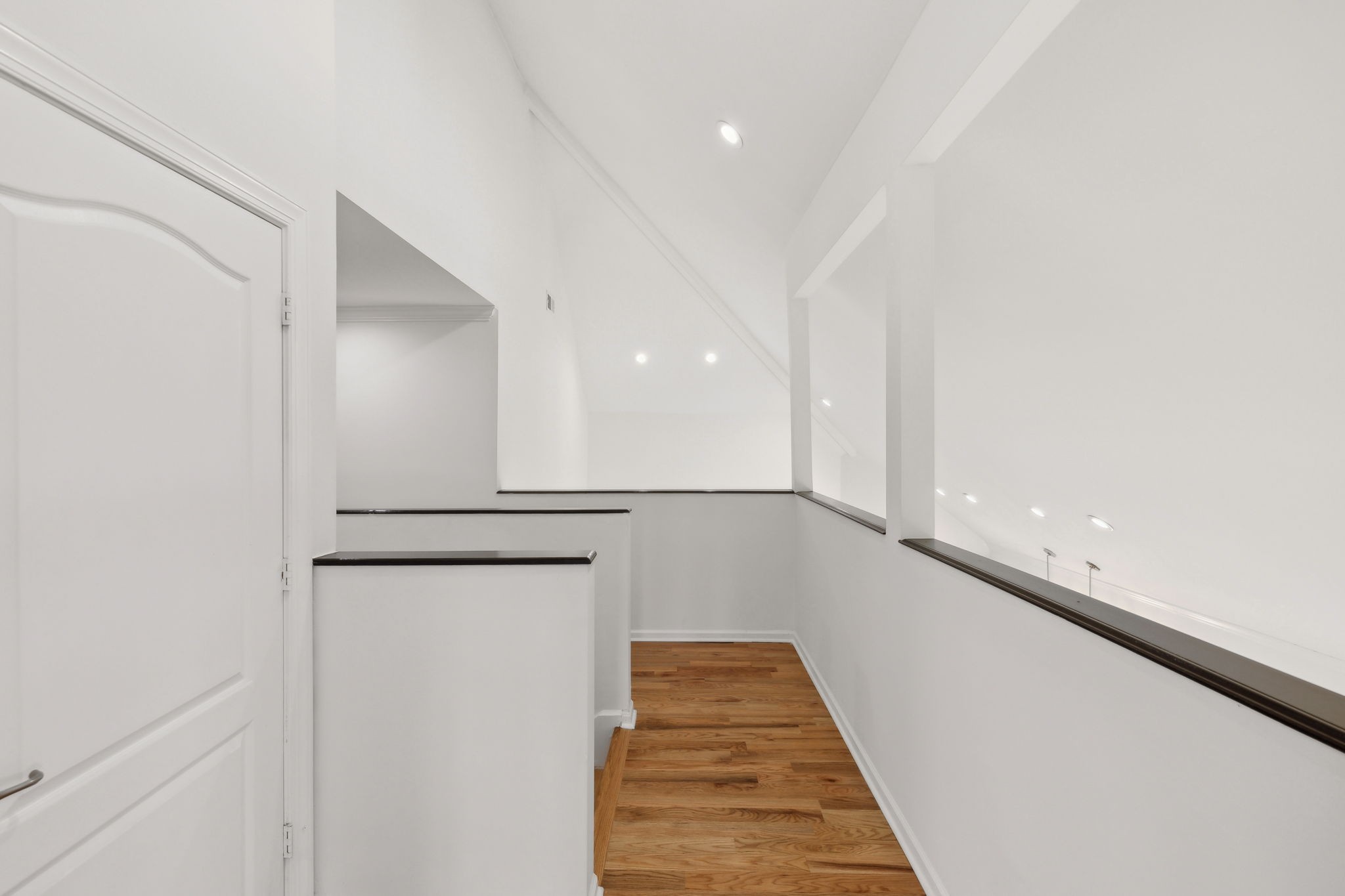 422 Davis Road Lebanon, TN 37087 - Photo 66 of 87 a view of a hallway with wooden floor and staircase