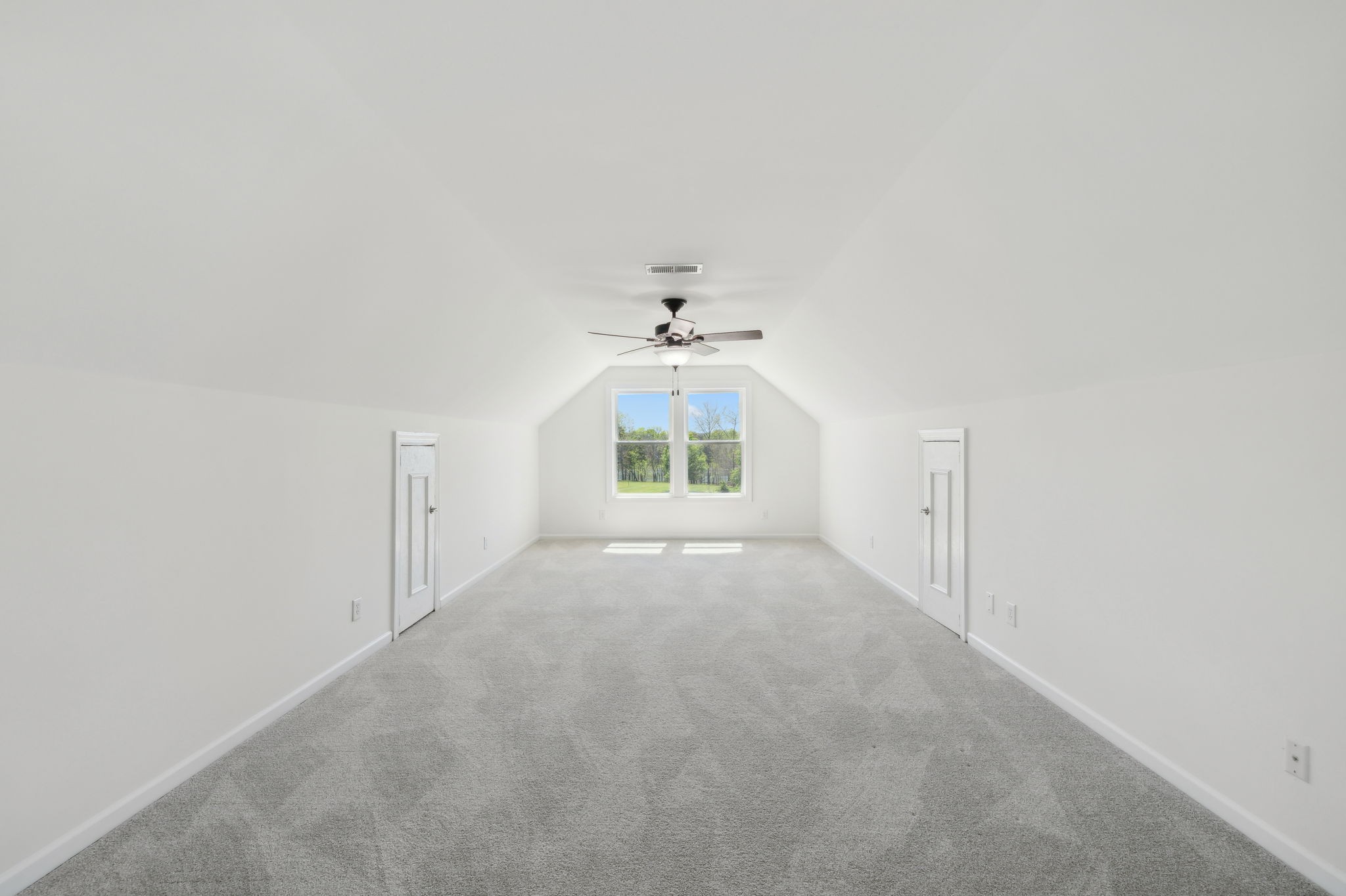 422 Davis Road Lebanon, TN 37087 - Photo 69 of 87 an empty room with windows and cabinet