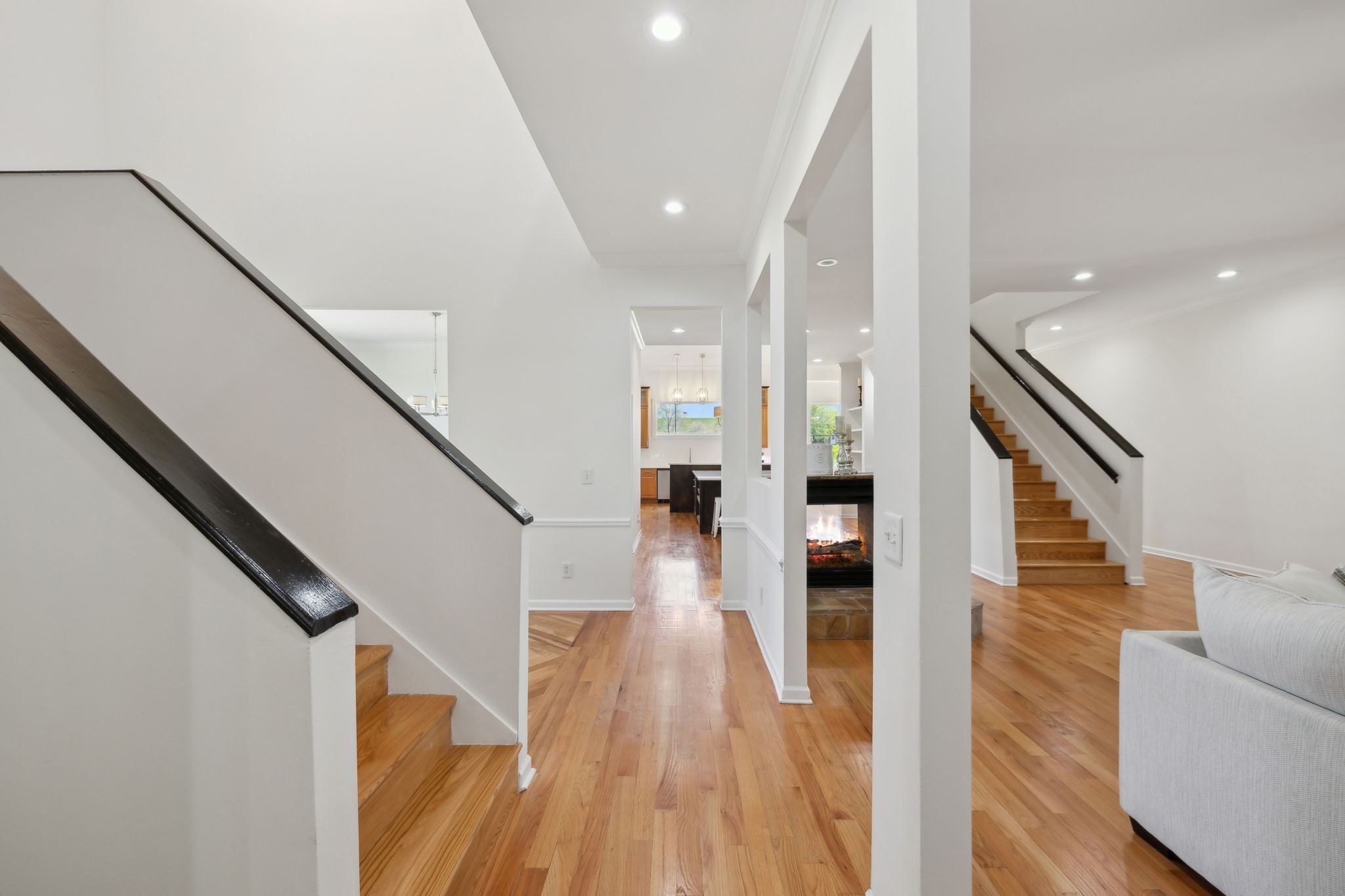 422 Davis Road Lebanon, TN 37087 - Photo 8 of 87 a view of a hallway with wooden floor and staircase