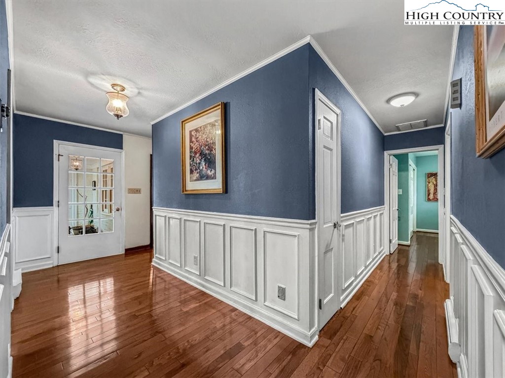 438 Glade Valley Road Glade Valley, NC 28627 - Photo 21 of 50 a view of an entryway with wooden floor