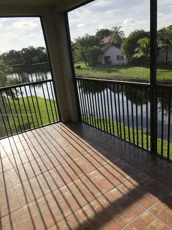 a view of balcony with a garden