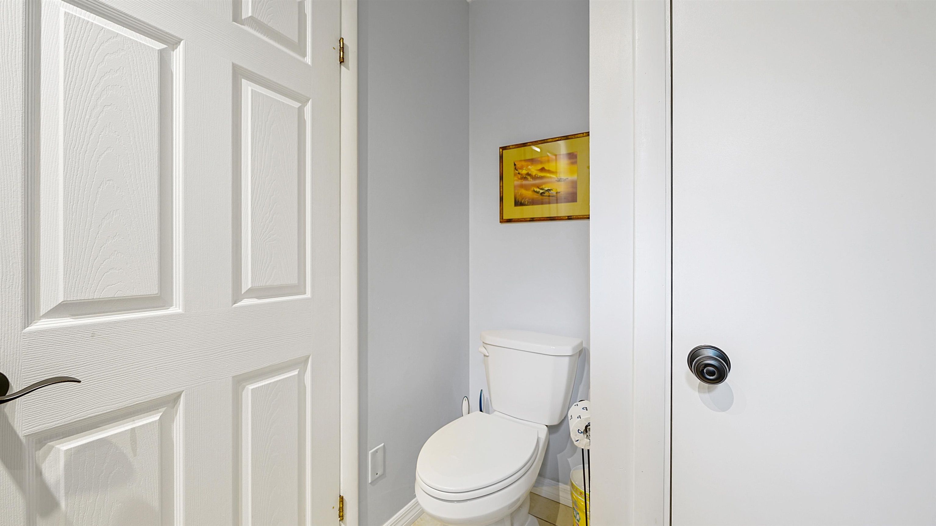 14 Sanchez Avenue, Unit B St. Augustine, FL 32084 - Photo 21 of 30 a white toilet sitting next to a shower