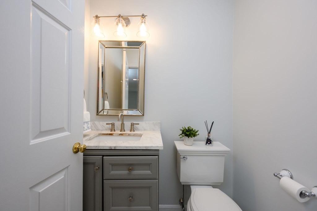 72 Pilgrim Trail Marshfield, MA 02050 - Photo 13 of 42 a bathroom with a sink vanity and toilet
