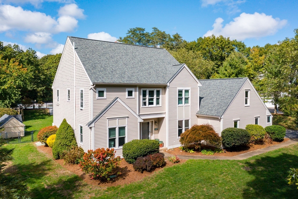 72 Pilgrim Trail Marshfield, MA 02050 - Photo 2 of 42 a front view of a house with a yard