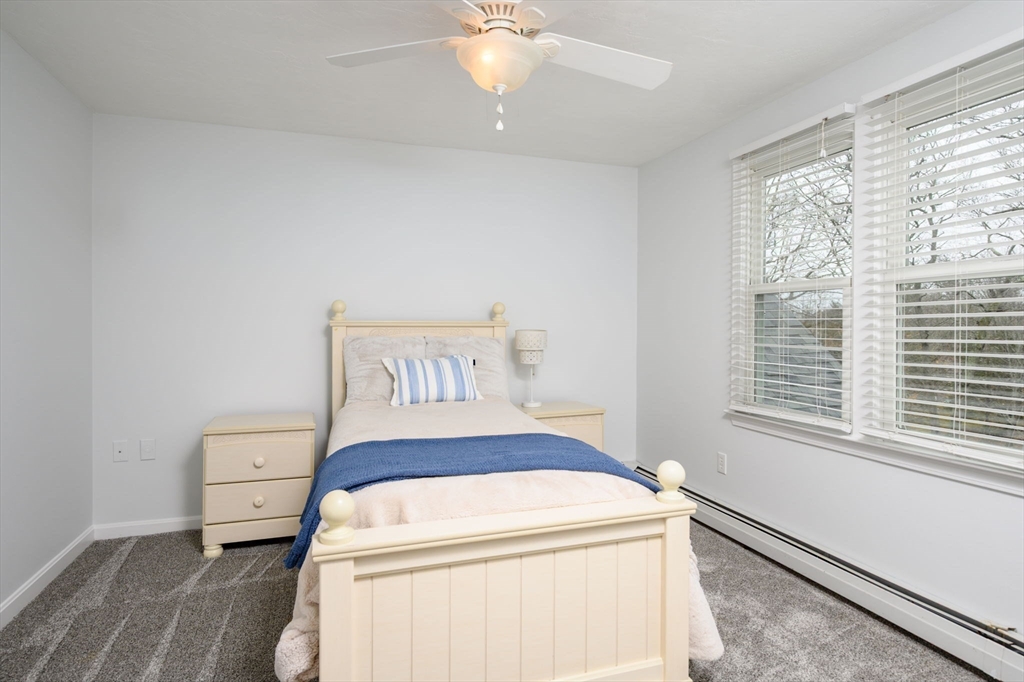 72 Pilgrim Trail Marshfield, MA 02050 - Photo 22 of 42 a hallway with a washer and dryer
